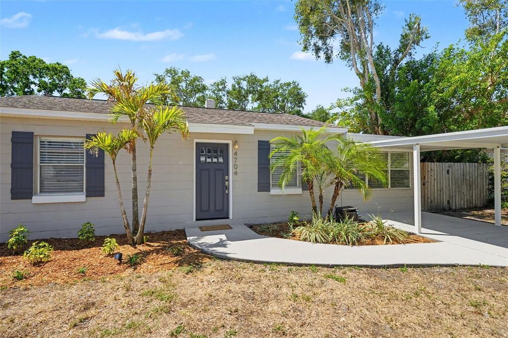 Photo of 4704 W Lawn Avenue, Tampa, FL 33611 (MLS # TB8503754)