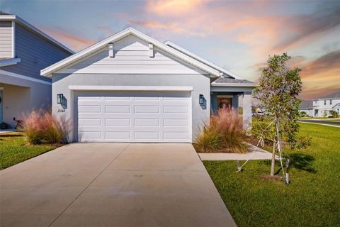 Photo of 13142 Cedar Elm Ln, Parrish, FL 34219 (MLS # A4670407)