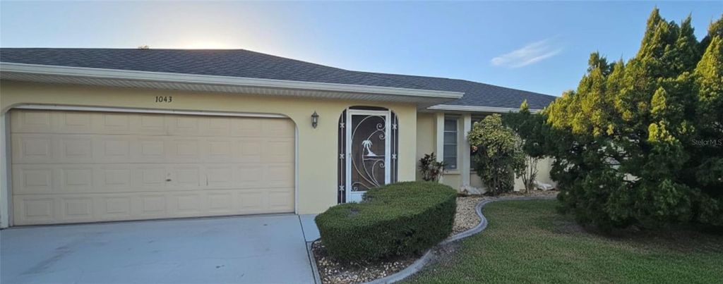 Photo of 1043 Riggs Street, Port Charlotte, FL 33952 (MLS # O6382851)