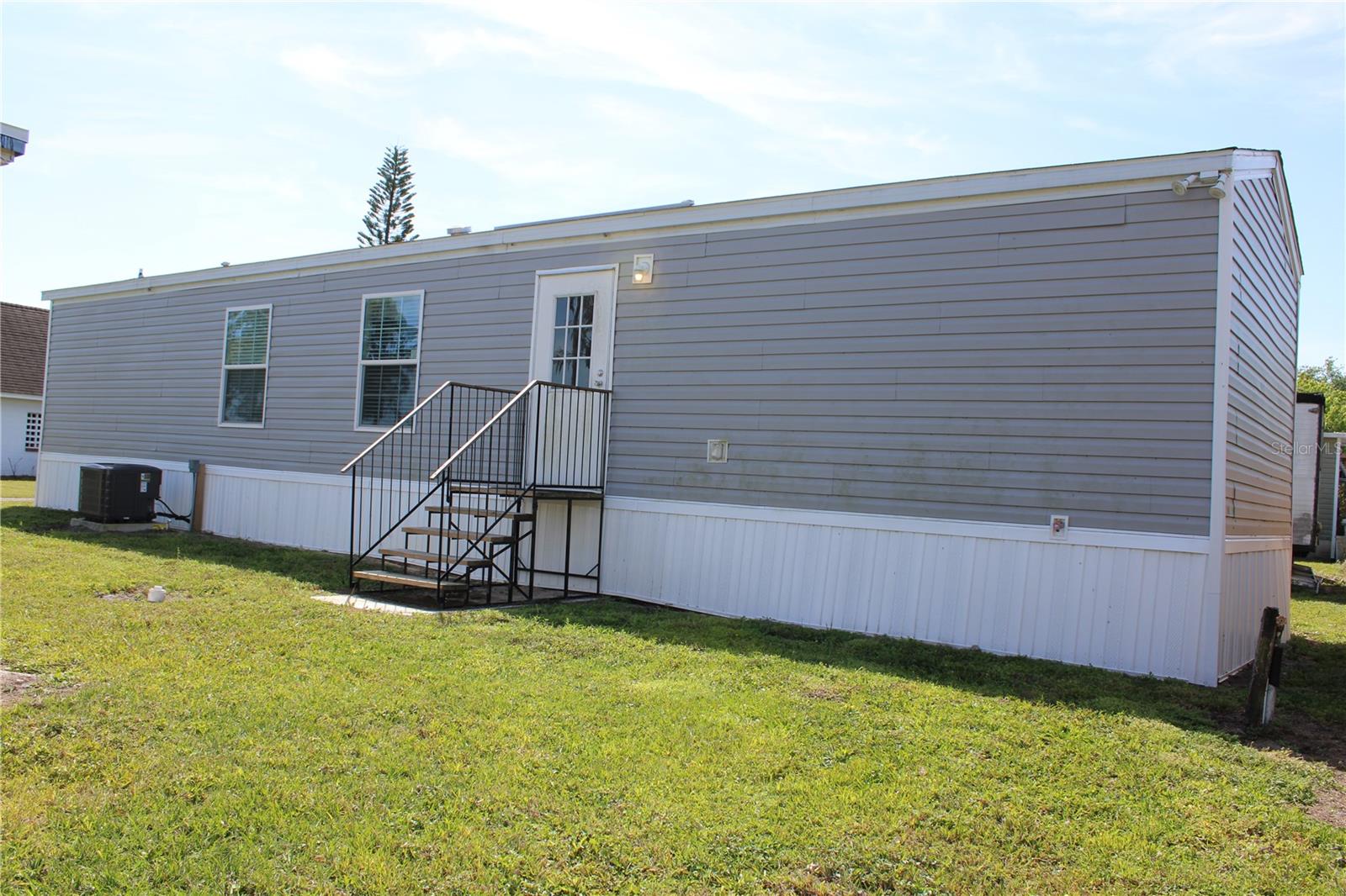 Welcome to this charming brand-new 2-bedroom, 2-bathroom manufactured home located at 5870 Cyprus Shores Ct, Orlando, FL. This beautifully designed home offers modern living with spacious interiors, featuring a bright and open floor plan perfect for both relaxation and entertaining. Enjoy the convenience of brand-new appliances, ample storage, and comfortable living spaces throughout. Situated in a peaceful and well-maintained community, this home provides an ideal setting for those seeking both tranquility and accessibility to Orlando's attractions and amenities.
With a lot rent of just $805/month, this home offers an affordable option in a prime location. Take advantage of the nearby shopping, dining, and entertainment options while enjoying the comfort of a brand-new home. Don't miss out on this fantastic opportunity—schedule your tour today!