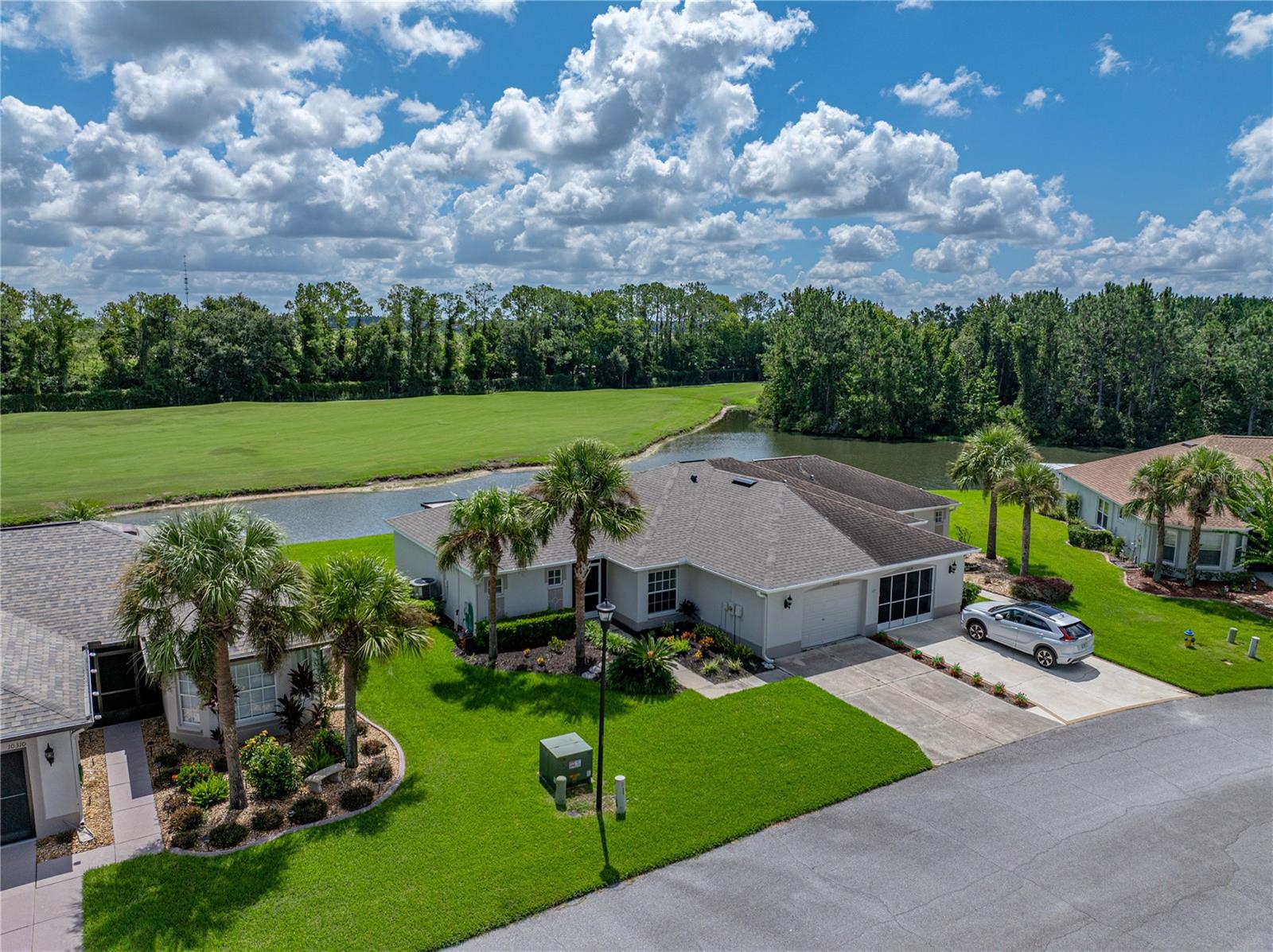 THIS IMMACULATE FULLY FURNISHED TURNKEY One Story RENTAL Villa OFFERING 2 Bedrooms 2 Full Baths & OVERSIZED 1 20X15 CAR GARAGE WITH GOLF CART STORAGE. BREATHTAKING PANORAMIC GOLF COURSE LOT on WITH SWEEPING WATER VIEWS! RETIRE IN LUXURY AT HIGHLY SOUGHT AFTER 55+ TAMPA BAY GOLF & COUNTRY CLUB! This Villa is PRISTINE! FULLY TURN KEY BEAUTIFULLY DONE! PEACE OF MIND WITH NEW ROOF, NEW GUTTERS, NEW EXTERIOR PAINT, NEW TOP OF THE LINE WATER TREATMENT SYSTEM, NEW STAINLESS STEEL FRENCH DOOR REFRIGERATOR, NEW SMOOTHTOP RANGE & NEW MICROWAVE, NEW STAINLESS TUB HIDDEN CONTROL TOP OF THE LINE DISHWASHER, GORGEOUS CURB APPEAL, ALL NEW ROCKSCAPING AND LOW MAINTENANCE LANDSCAPING, GORGEOUS FRONT ENTRY WITH TILE FRONT PORCH. Open and Spacious Split floor plan COMES FULLY FURNISHED with 2 FULL BEDROOMS, PRIMARY IS OUTFITTED WITH A BRAND NEW KING SIZE BED AND ALL BRAND NEW LINENS, SECOND BED IS SET UP AS A TV ROOM, LIVING ROOM FEATURES A BRAND NEW PULL OUT SOFA BED NEVER USED! VAULTED CEILINGS & CERAMIC TILE wet areas, BRAND NEW PLUSH CARPETING, OPEN SPACIOUS FLOOR PLAN WITH MID CENTURY MODERN CHARM, WELL APPOINTED FURNISHED RENTAL COMPLETE WITH ALL KITCHENWARE, (POTS, PANS, GLASSWARE, TERVIS TUMBLERS, CUTLERY AND DISHWARE, HUGE REAR COVERED SCREENED LANAI. UPDATED KITCHEN WITH SOLID WOOD KITCHEN CABINETRY, ALL NEW STAINLESS APPLIANCES, SATIN NICKEL HARDWARE, DEEP DOUBLE BOWL SEAMLESS KITCHEN SINK, MODERN SATIN NICKEL GOOSENECK FAUCET WITH PULL DOWN SPRAYER, IN COUNTER SOAP DISPENSER, 4 BURNER PLUS WARMING ZONE 5TH ELEMENT, SPACIOUS OVEN with STEAM CLEAN FUNCTION, FRENCH DOOR & DUAL DRAWER DESIGN REFRIGERATOR WITH IN DOOR FILTRATION FOR ICE & WATER!! SPACIOUS PRIMARY SUITE WITH BREATHTAKING VIEWS OF THE GOLF COURSE, BRAND NEW KING MATTRESS AND LINENS NEVER USED!! ON SUITE BATH WITH LARGE WALK IN SHOWER W/ GLASS SHOWER DOOR, TWO HUGE PRIMARY WALK IN CLOSETS &. LINEN STORAGE CLOSET! BRAND NEW Designer PRISTINE Interior Paint, LUXURIOUS 2" WOOD BLINDS THROUGHOUT, Ceiling Fans IN BOTH BEDROOMS, OVERSIZED 1 1/2 CAR GARAGE WITH EXCELLENT STORAGE SPACE/ROOM FOR A GOLF CART! All Appliances including W/D INCLUDED IN THE RENT. TAMPA BAY GOLF & COUNTRY CLUB IS OUTSTANDING With ACCESS to a Wealth of Amenities, including TWO SWIMMING POOLS with CLASSES, HOT TUB, LIGHTED TENNIS & PICKLEBALL COURTS, SHUFFLEBOARD, CORNHOLE, STATE OF THE ART FITNESS CENTER, TWO DOG PARKS, FIRE PIT & LOADS OF SOCIAL OPPORTUNITIES AT 3 CLUBHOUSES, offering a FULL SERVICE RESTAURANT, THE PUB & GRILL, MULTIPLE CARD ROOMS, BILLIARD ROOM, FULLY STOCKED LIBRARY, AUDITORIUM SPACE, MEETING ROOMS, EVENT ROOMS, ACTIVITY CENTER, CRAFT ROOMS, CLUBS, ORGANIZED EVENTS & More! Experience the epitome of luxury living in the Tampa Bay Golf & Country Club WHILE BEING SO CLOSE TO EVERYTHING in the Fantastic San Antonio/Wesley Chapel Area. Full of Unparalleled Options for Dining, Nightlife, Shopping, Entertainment and Top Medical Facilities. Convenient to I 75 and SR 54 Corridor where you can enjoy the Shops at Wiregrass, The Tampa Premium Outlets, The Grove at Wesley Chapel with the NEW Krate Dining, Shopping and Entertainment Experience. The Largest Ice Rink in the Southern US, The First Outdoor Snow Park Snow Cat Ridge open during the winter with ice skating, tubing, dining & entertainment in the Igloo Village. Access to the Best Healthcare with Multiple Advent Health's, Moffitt Cancer Center, The VA Hospital & USF Health. Enjoy Busch Gardens, The MOST BEAUTIFUL BEACHES IN FLORIDA & Downtown.
