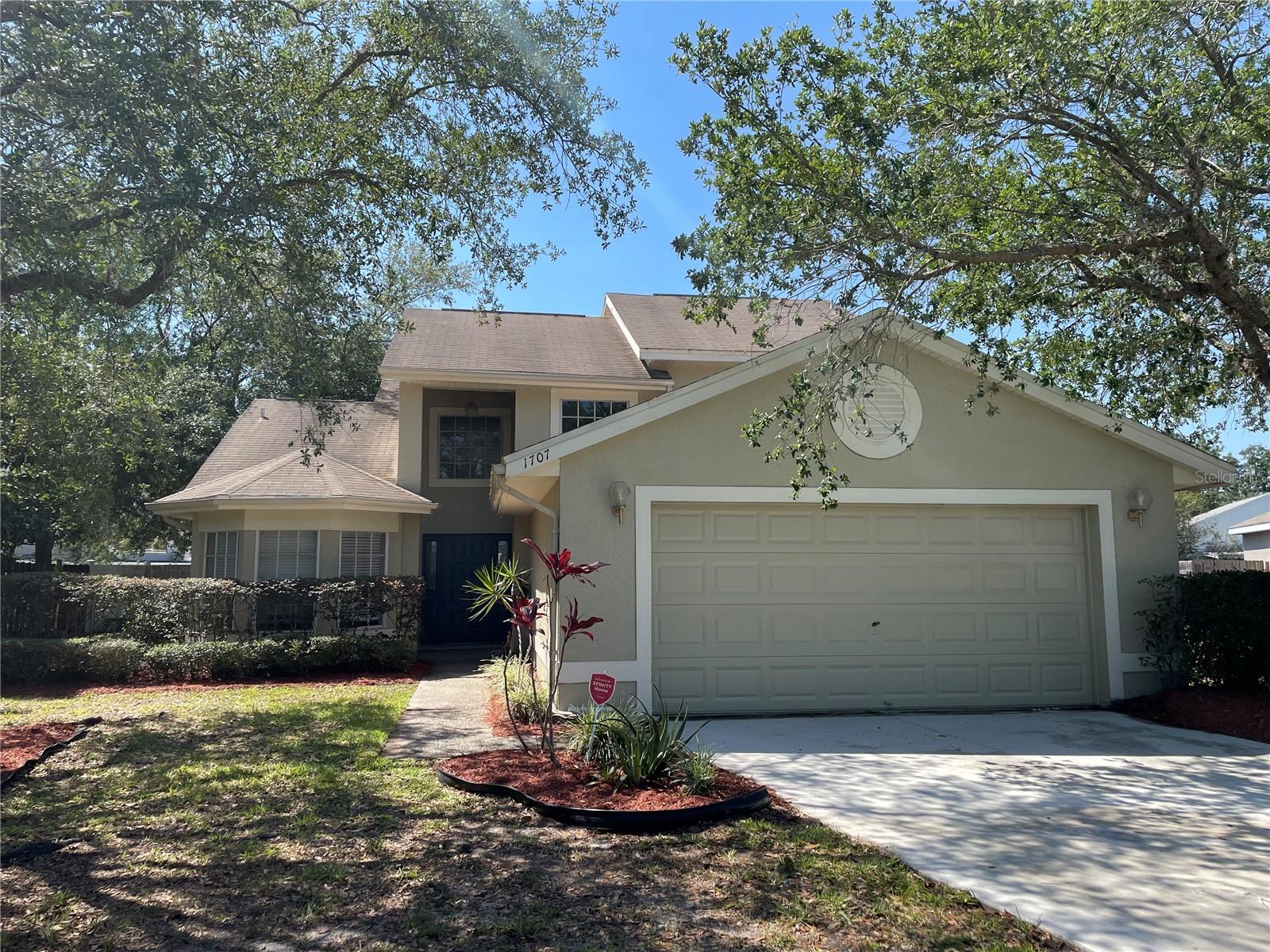 See 3D Visual Tour. Professional photos coming. Welcome to the serene community of Cypress Springs. This beautifully maintained home sits nestled within a cul-de-sac. The extra-long driveway provides additional parking for guests or a growing family. As you enter the foyer, you are greeted with vaulted ceilings and clerestory windows allowing an abundance of natural light. The spacious living room has custom niches and shelving. Durable vinyl and ceramic tile flow throughout the first floor. The kitchen is equipped with appliances, wood cabinets and a breakfast nook accented with a bay window. The master is located on the first floor and is outfitted with French doors leading to the screened lanai. The master bath has dual sinks, an updated tile shower and separate garden tub. The split floor plan provides roomy bedrooms 2 & 3 upstairs with neutral carpet. The large, screened lanai is a great space for entertaining or just relaxing on the weekend and evenings. Extra storage in the attic with flooring and stairs. The community is zoned for sought after schools. Cypress Springs boasts an array of amenities which include a community pool, pavilion, tennis courts, playground and trails for walking/running/biking. Easy access to 408, 417, with proximity to UCF, Valencia College, Waterford Lakes Town Center, Downtown Orlando, Research Parkway and Orlando International Airport!