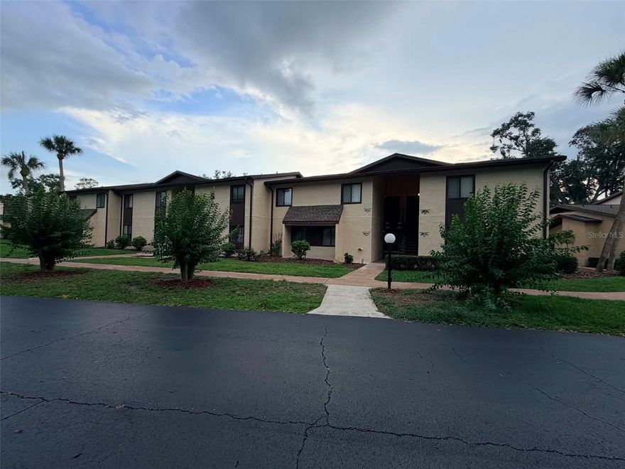 Stunning Second-Floor Condo with Peaceful Lake Sparkle Views! This beautifully updated 55+ residence is truly move-in ready and thoughtfully designed with today’s modern conveniences and stylish finishes throughout. Enjoy added comfort, convenience, and security with a Nest thermostat, Ring doorbell, and keyless coded front door entry.

The beautifully remodeled kitchen is a standout feature, showcasing brand-new granite countertops and all-new Samsung Smart appliances that combine elegance with efficiency. A convenient pass-through to the dining area serves as both a breakfast bar and an ideal space for serving meals while entertaining.

The open-concept floor plan seamlessly connects the kitchen, dining, and living areas, creating a spacious and inviting atmosphere perfect for entertaining guests or simply relaxing in comfort. Luxury Life Proof LVT flooring has been installed throughout the entire condo, adding durability and style.

The spacious primary suite offers a walk-in closet along with additional dual hallway closets leading to the private ensuite bath. The ensuite features granite countertops and a modern smart-touch mirror, providing both luxury and functionality.

This condo is being offered fully furnished (excluding wall art), making it ideal for immediate occupancy or a seasonal retreat. Two room air purifiers are also included, helping maintain fresh, clean indoor air.

Step onto the enclosed rear porch and unwind with your morning coffee or evening cocktail while enjoying tranquil views overlooking Lake Sparkle. Storage is abundant with a finished front porch storage closet plus an additional storage closet on the enclosed back porch.

Residents enjoy a smoke-free community and nearby access to the community pool. For only $5/year, additional amenities are available including a community center, basketball courts, pickleball, tennis, and more. Service and emotional support animals are welcome, making this an inclusive and welcoming place to call home.