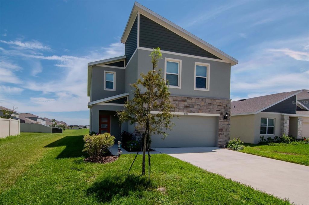 Photo of 9744 Crescent Ray Drive, Wesley Chapel, FL 33545 (MLS # TB8427551)
