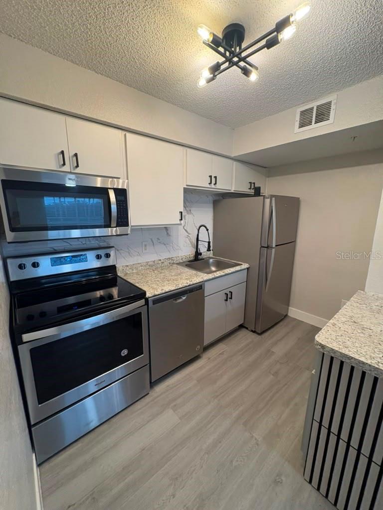 Photo of 2216 Grand Cayman Court #1422, Kissimmee, FL 34741 (MLS # O6418105)