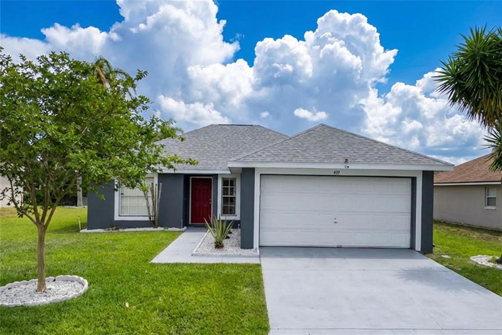 Photo of 419 Wellesly Drive, Davenport, FL 33897 (MLS # TB8503449)