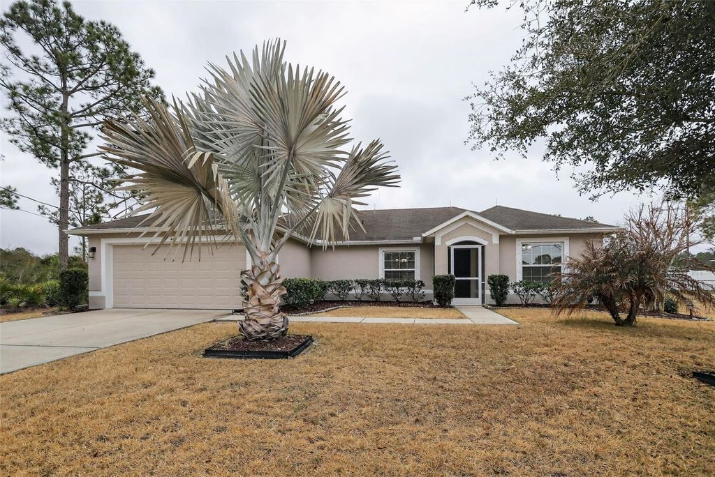 Photo of 46 Sea Trail, Palm Coast, FL 32164 (MLS # TB8476269)