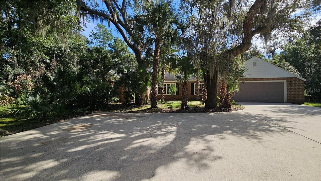 Photo of 6217 Shoreline Drive, Port Orange, FL 32127 (MLS # V4951616)