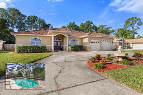 Photo of 54 Fairbank Lane, Palm Coast, FL 32137 (MLS # FC313658)