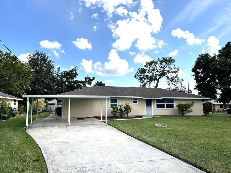 Welcome home to your sanctuary with a park-like feel. With no deed restrictions and a huge corner lot, this property provides plenty of room to roam in close proximity to beaches, shopping, dining, golfing and all amenities the Gulf Coast of Florida has to offer. The dwelling has been meticulously maintained and updated as needed, with an open floor plan offering huge bedrooms, two full bathrooms, full size laundry room with separate side entrance, and a large rear room that can be used to the owner's preference as a family room/den, formal dining room, or even a fourth bedroom. Come fall in love with this amazing property which offers great value in a prime location. The mature landscaping provides a nature preserve feel and the large fenced corner lot with a screened lanai and two storage sheds provides endless possibilities with room for secure storage of all your toys, plenty of room for the kids and pets to play safely, or add a pool and pickleball court for a thriving vacation rental. The floorplan and all improvements have made this property extremely livable and flexible. Public utilities with a well sourced irrigation system to keep the yard beautiful and green. All appliances included in the sale. Great neighbors, quiet neighborhood with no through traffic. Schedule your private showing now while it's still available.