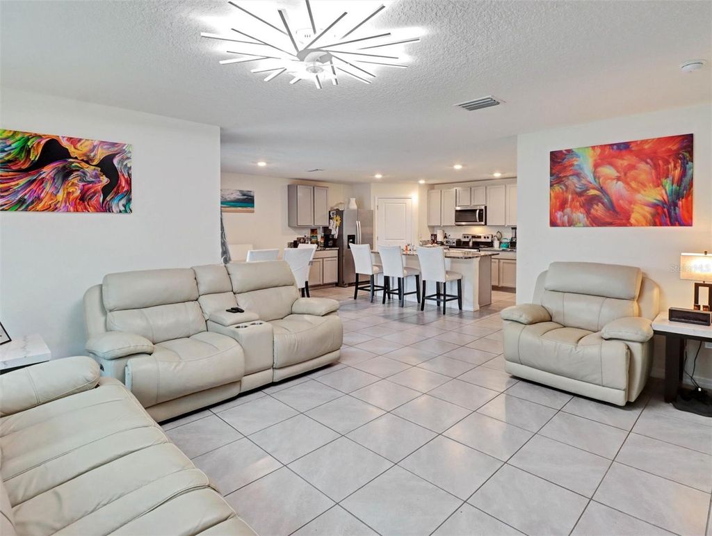 Photo of 1202 Tahitian Sunrise Drive, Plant City, FL 33565 (MLS # TB8501210)