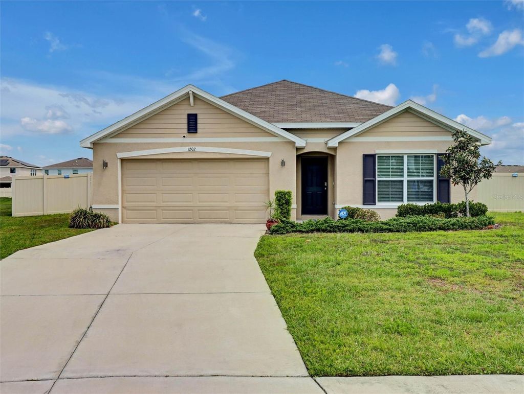 Photo of 1202 Tahitian Sunrise Drive, Plant City, FL 33565 (MLS # TB8501210)