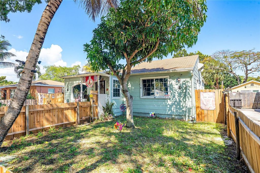 Photo of 825 Winters Street, West Palm Beach, FL 33405 (MLS # O6383343)