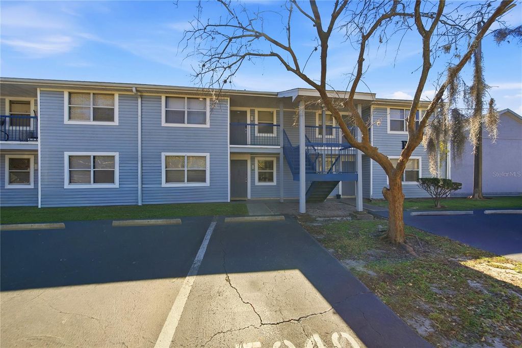 Photo of 5040 Terrace Palms Circle #102, Tampa, FL 33617 (MLS # TB8471874)