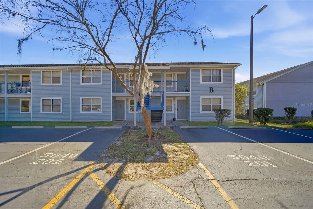 Photo of 5040 Terrace Palms Circle #102, Tampa, FL 33617 (MLS # TB8471874)