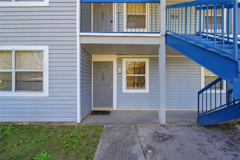 Photo of 5040 Terrace Palms Circle #102, Tampa, FL 33617 (MLS # TB8471874)