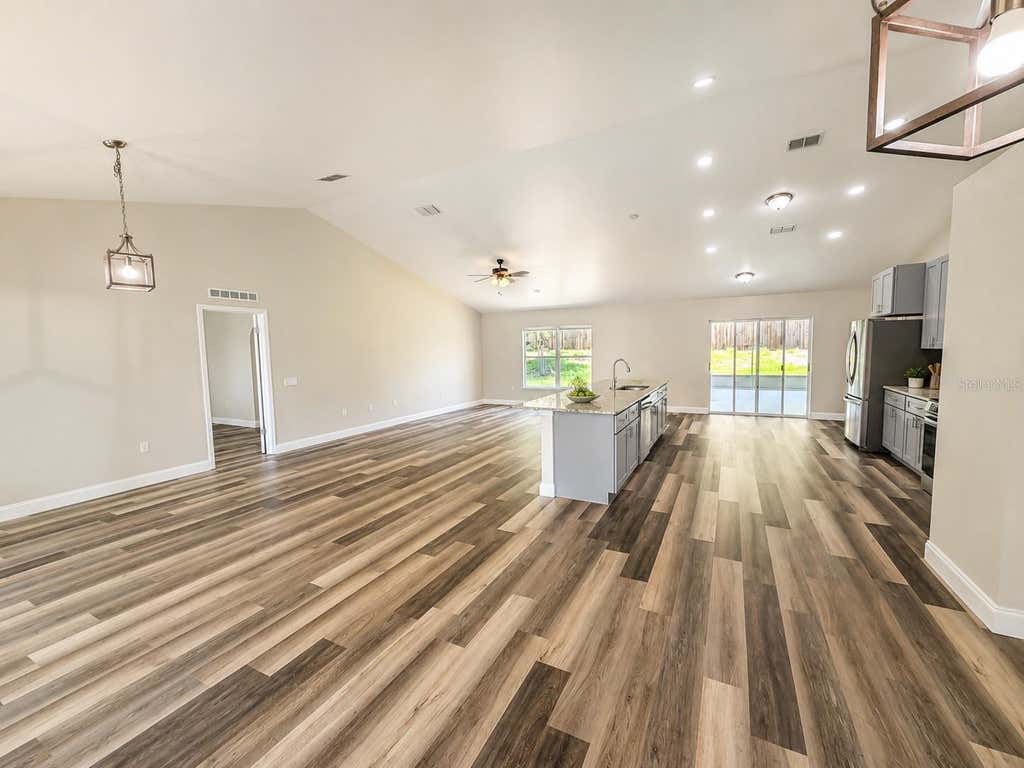 Photo of 3228 White Blossom Lane, Clermont, FL 34711 (MLS # O6418327)