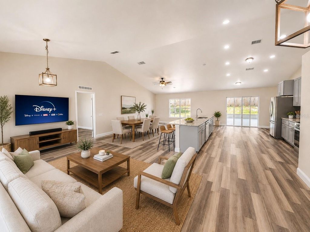 Photo of 3228 White Blossom Lane, Clermont, FL 34711 (MLS # O6418327)