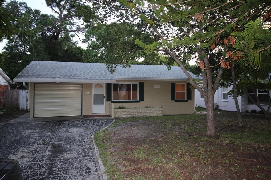 GREAT LOCATION! Cute 2 bedroom 1 bath 1 car garage home located within walking distance to the Halifax River and parks in Ormond Beach, Florida.  Concrete block construction with vinyl siding.  Walk out the dining room to a screened back porch overlooking  the large wood privacy fenced back yard with mature trees. Newer roof and water heater. Move in ready. Great for a retiree, new family just starting out, or winter get away. ;Water: City