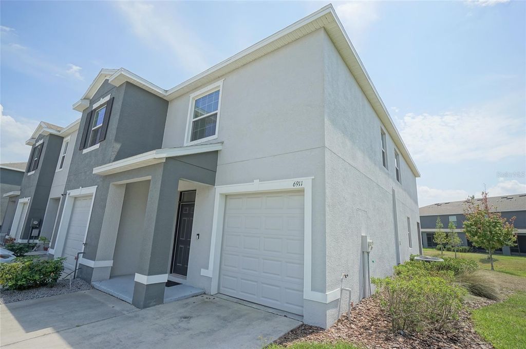 Photo of 6911 Breezy Palm Drive, Riverview, FL 33578 (MLS # TB8475013)