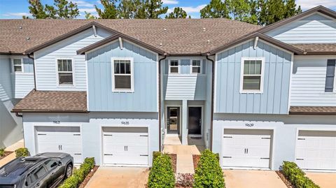 Photo of 19635 Shady Oak Drive, Land O Lakes, FL 34638 (MLS # TB8436340)