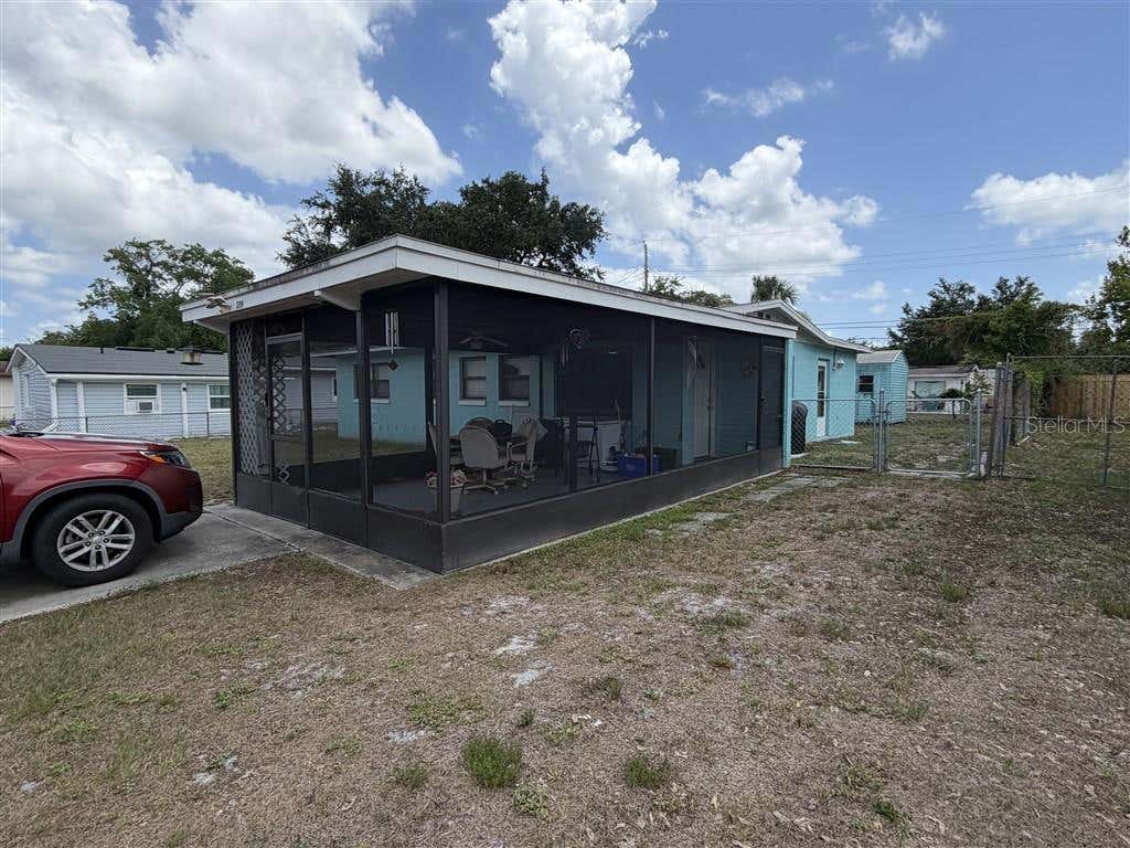 Photo of 209 Palm Place, Sanford, FL 32773 (MLS # O6413228)
