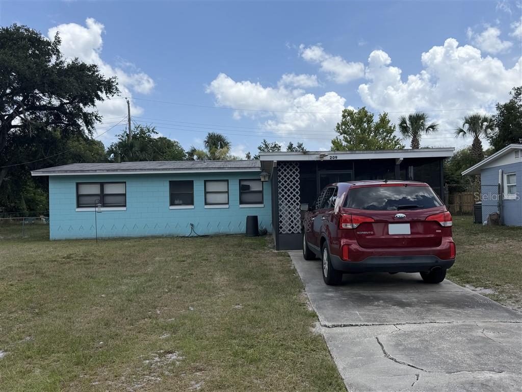 Photo of 209 Palm Place, Sanford, FL 32773 (MLS # O6413228)