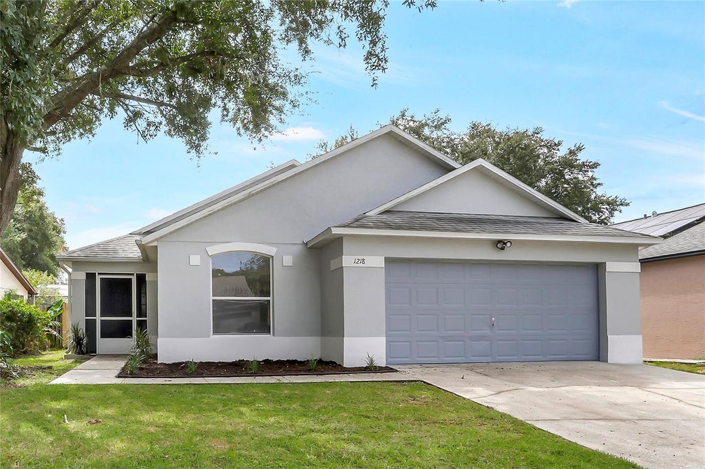 Photo of 1218 Whitewood Way, Clermont, FL 34714 (MLS # O6447639)