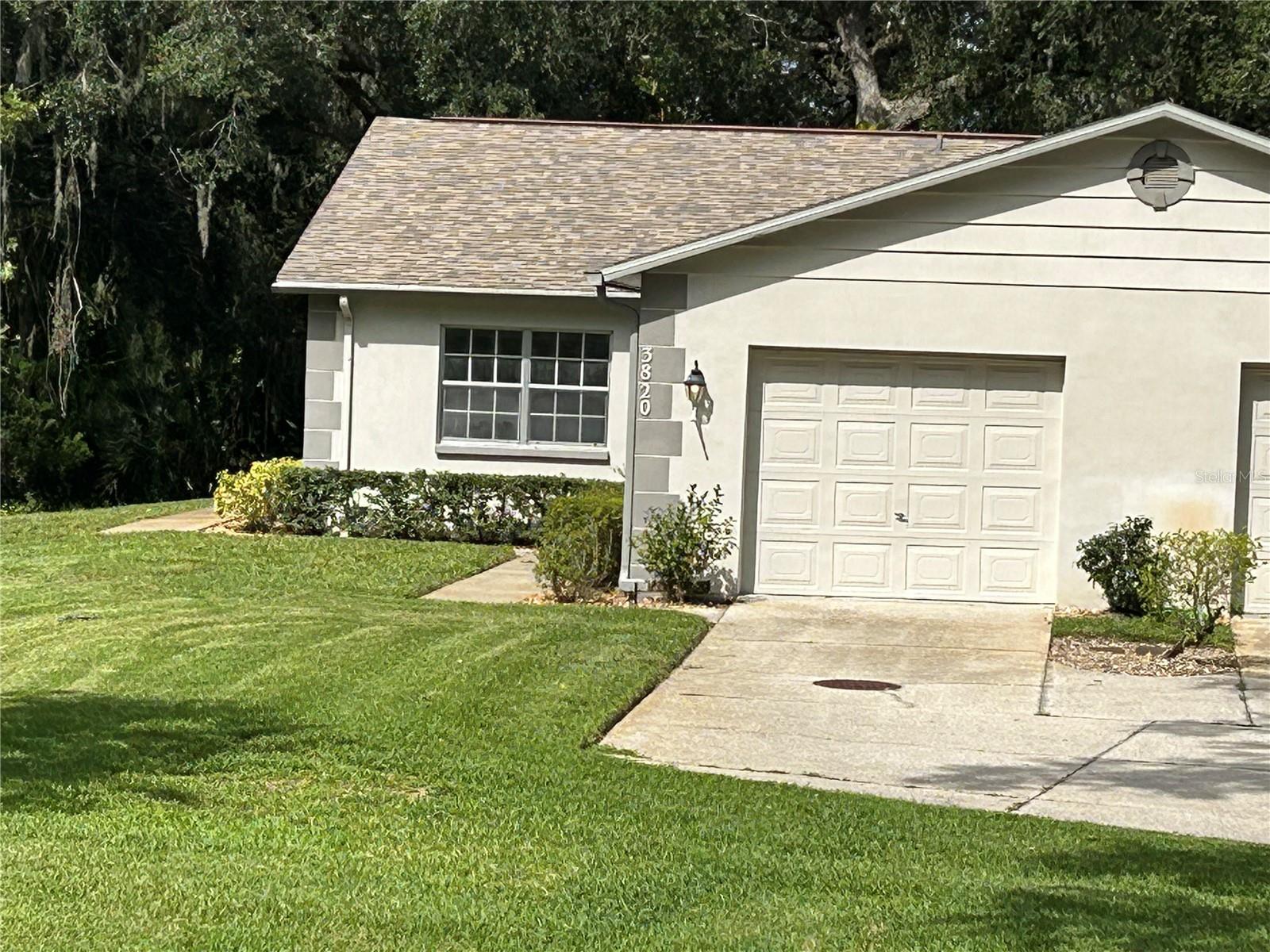 FANTASTIC INVESTMENT OPPORTUNITY TO PICK UP THIS FIXER UPPER IN NEED OF SOME COSMETIC TLC. THIS WILL BE A CASH SALE. NO MORTGAGE OFFERS WILL BE ACCEPTED. NO VERBAL OFFERS WILL BE ENTERTAINED. HOME TO BE SOLD AS-IS AND ALL INSPECTIONS ARE TO BE COMPLEATED BY THE BUYER PRIOR TO ANY CONTRACT SUBMITTED FOR CONSIDERATION BY SELLERS. This units homesite has arguably the best location in the entire community. Enjoy the quiet and peaceful golf course view from your Primary Bedroom, enclosed lanai and open patio. homesite also includes a huge garden area on all 3 sides, oversized driveway, Cul de sac, and guest parking spaces nearby. The home includes features like 2 master suites on a split plan, 2 nice sized bathrooms, large Great Room, inside laundry, open kitchen with breakfast bar and attached, private 1 car garage. Monthly fee is extremely reasonable for the amount of features that are included like Basic Cable, internet, lawn care, trash removal, community pool, and more!!! All this for an unbelievable price in the Trinity zip code!!!!