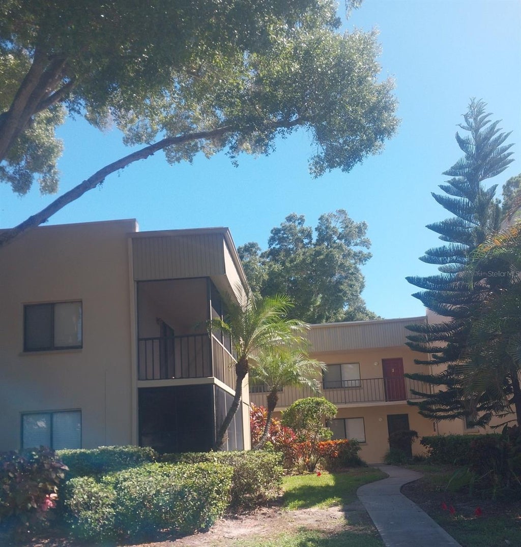 Photo of 3300 Fox Chase Circle N #201, Palm Harbor, FL 34683 (MLS # TB8559633)