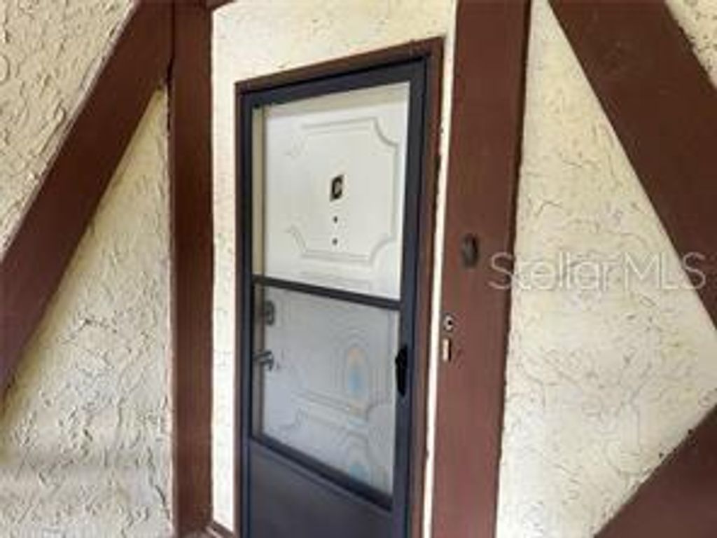 Photo of 500 Newell Hill Road #104C, Leesburg, FL 34748 (MLS # O6381147)