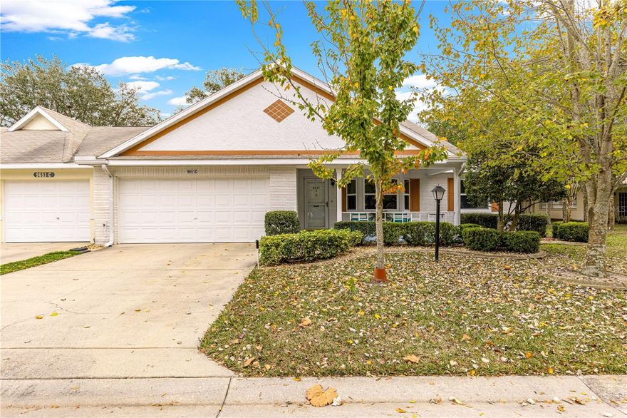 This Augusta model home is located in the premier 55+ community of On Top of the World. This home is an end unit featuring a nice lot, 2 bedrooms, 2 baths and a library/den with a 2 car garage. Roof scheduled to be replaced in 2026 (paid by seller) There is a nice sized front porch perfect for you morning cup of coffee.  Upon entering you will notice the spacious living/dining combo with vaulted ceilings. The den/office space is to the right side with plenty of cabinets and shelves for storage. The eat-in kitchen is quite large with several cabinets and lots of counter space. There is an enclosed 3 season Lanai in the back and a concrete pad partially covered. Perfect for grilling and entertaining. The primary bedroom is generously sized, walk in closet, step in shower and new vanity. Guest side of the home has a nicely sized bedroom with walk-in closet and tub/shower combo in the bath. The 2 car garage also houses your washer and dryer.