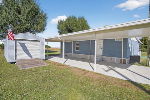 Photo of 17536 Brinkerhoff Lane, Okeechobee, FL 34974 (MLS # TB8448585)