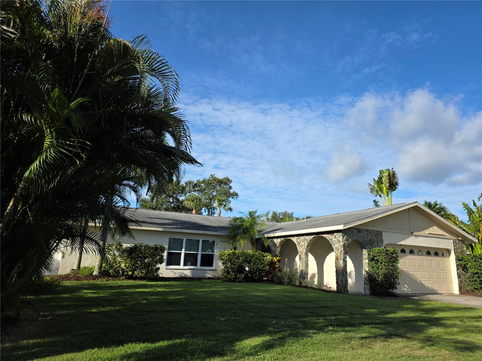 Marvelous opportunity to own a home in the sought after community of Seminole Grove Estates. The owner has equipped this 3 bedroom 2 bath pool home with solar electricity and an Electric Vehicle Charging Station saving you money in years to come. The property backs up to a pond where you can launch a kayak and the lot sits at a high elevation so flood insurance is not required.
When you enter the home your welcomed by the warm tones of the wood tile floors that lead you to the Master Bedroom and tranquil Master Bath and walk-in closet. Once you enter the Kitchen you are captivated by the view of your pool, spa and beautifully manicured lawn. The kitchen has plenty of counter space and the breakfast nook is so comfy you will stay until lunch before you retire to your easy chair in the spacious Family Room.
You will wonder at the possibilities the owner has in store when you realize the transition to a 1 Bedroom, 1 Bath studio with private entrance and kitchenette simply by closing a door. You will still enjoy private use of the formal living/dining room, Master suite, Kitchen and Family room. Great set up for parent, college student, room mate or if you work nights and need privacy.
The schools are Grade A, the location is ideal.