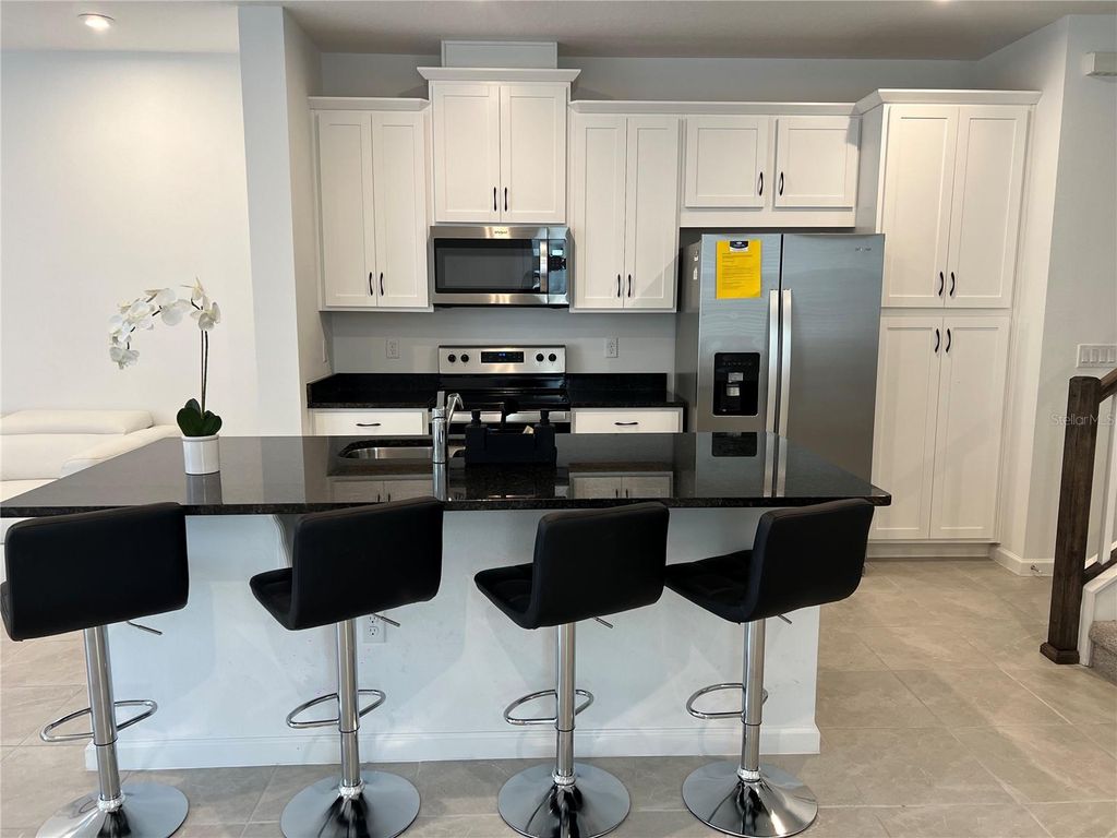 Photo of 9055 Beach Tea Way, Kissimmee, FL 34747 (MLS # O6366053)