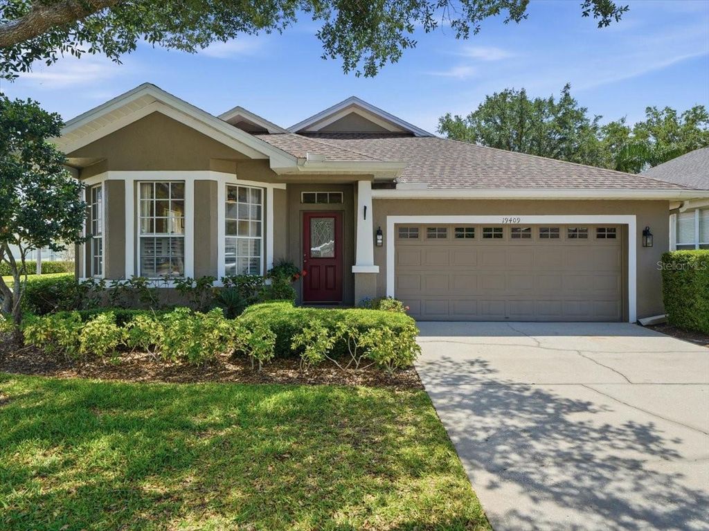 Photo of 19409 Golden Slipper Place, Lutz, FL 33558 (MLS # TB8506774)