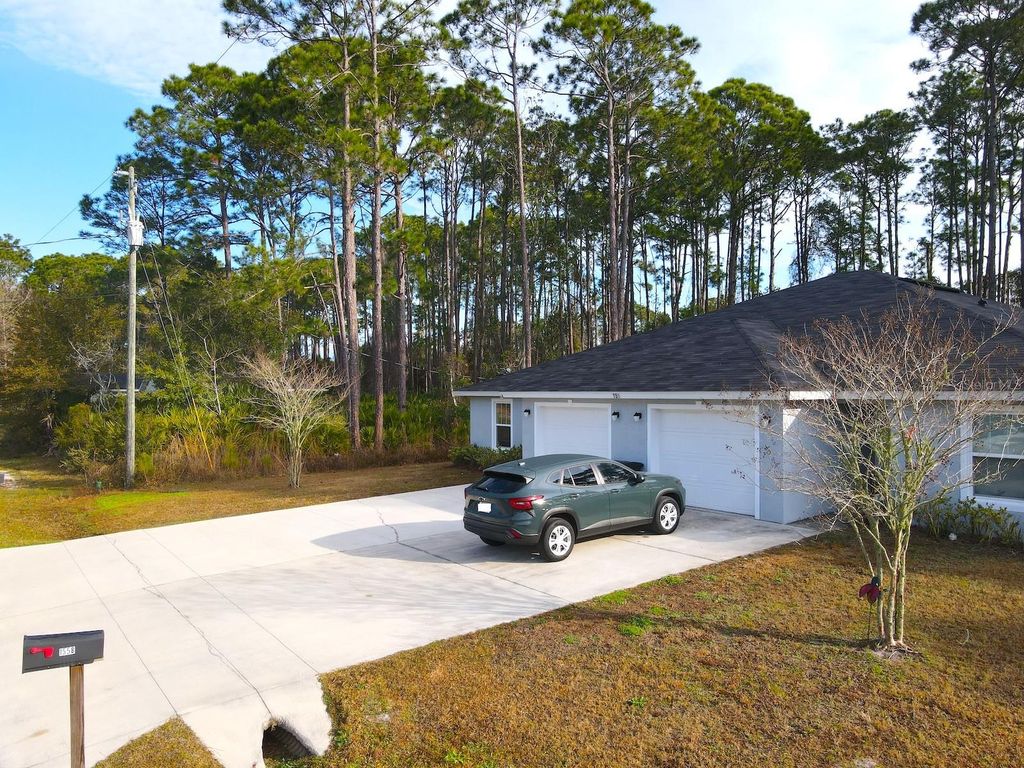 Photo of 155 Ullian Trail #A, Palm Coast, FL 32164 (MLS # FC315521)