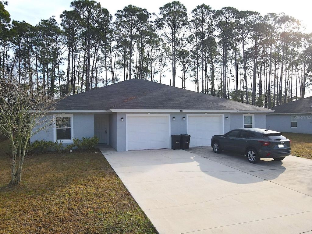 Photo of 155 Ullian Trail #A, Palm Coast, FL 32164 (MLS # FC315521)