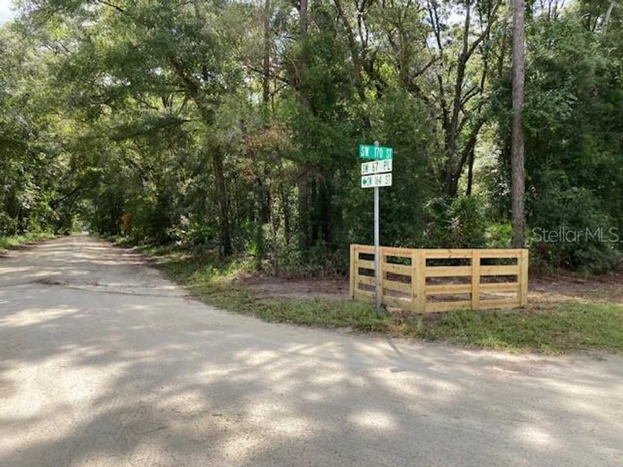 Just reduced! Enjoy the benefits of rural living without the inconvenience when you build your dream home on this gorgeous 5.16 acre lot. Plus, high speed fiber internet, which is rare for rural lots. Natural Florida beauty and wildlife abounds on this high and dry wooded lot, conveniently located just 3.7 miles from Archer Road, 4.6 miles from Newberry Road, 10 minutes from the Jonesville Publix and an easy commute to UF and Shands. It is only 5 miles to Archer Elementary and 8 miles from both Oak View Middle School and Newberry High School, making it the perfect place to raise your family. Easily accessible via either paved road or excellently maintained shell rock road, a rarity for land parcels of this size. Please note that mobile homes are not permitted, but with no minimum requirement for building square footage you have the freedom to decide what home will best fit you and the added benefit of no HOA fees. Plus, high-speed fiber internet, which is rare for rural lots!