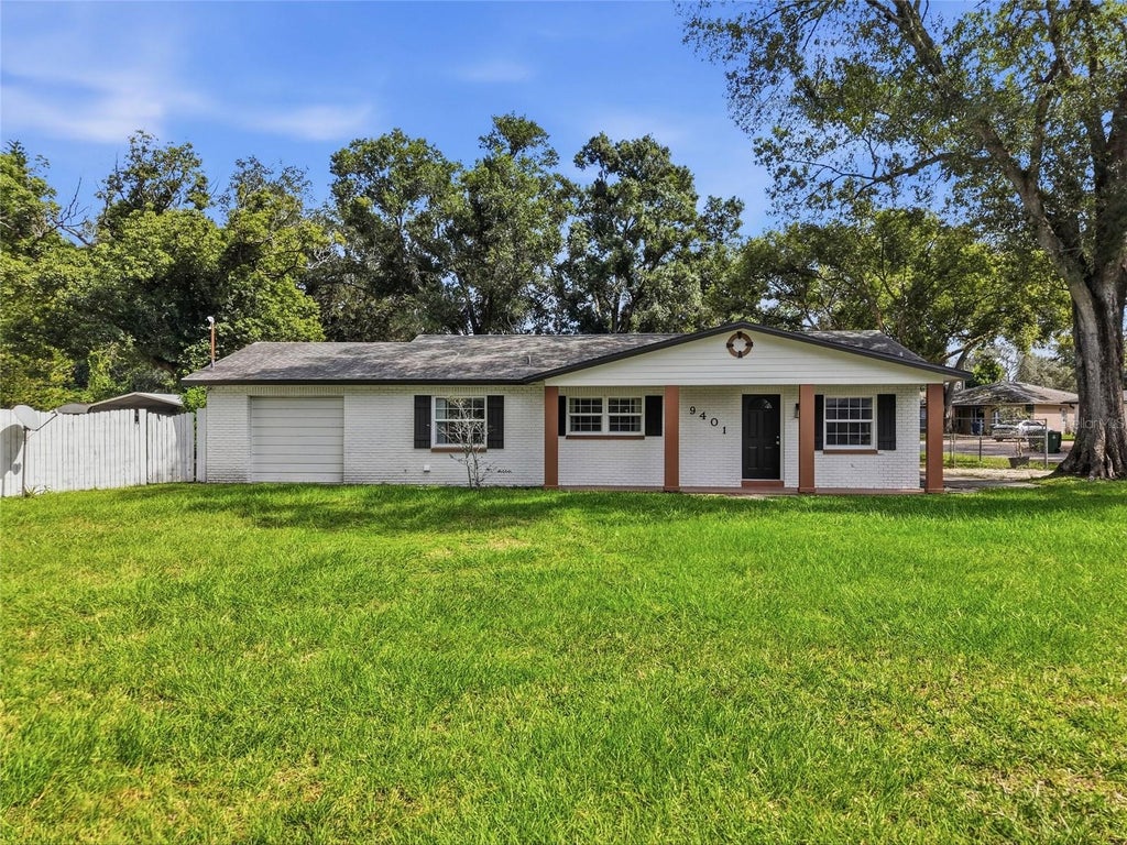 Photo of 9401 N Rome Circle, Tampa, FL 33612 (MLS # O6445507)