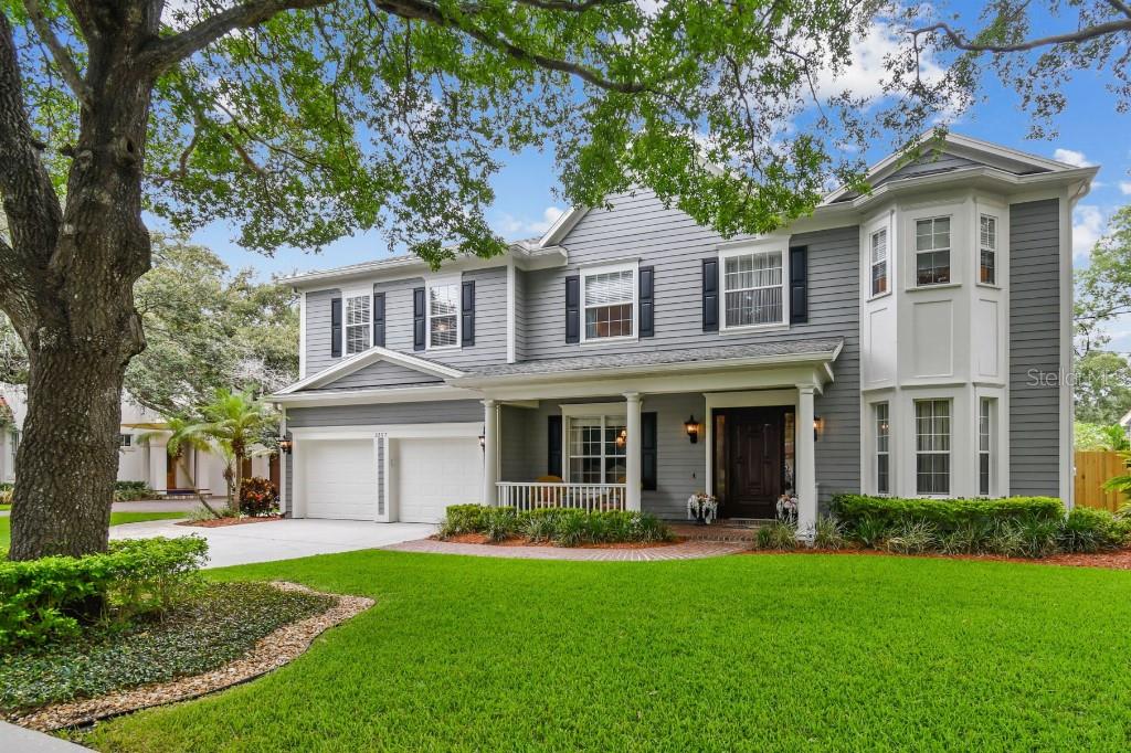 Welcome to 3207 W Harbor View Avenue located in the Bayshore Beautiful neighborhood where stately oak lined streets, top schools (Roosevelt/Coleman/Plant district), and small town convenience (10 minutes to downtown and airport, 1 block from Bayshore Blvd) make luxury living a breeze.
This custom built traditional home opens to a grand foyer, a cozy living room, and formal dining area. Continue into a spacious great room featuring double French doors overlooking the pool which is perfect for entertaining. Large windows here and in the breakfast nook add to the bright and airy feel. The inviting open kitchen features a commanding center island, granite countertops, and cherry wood cabinets. The downstairs bedroom and full bath has exterior access for pool use and doubles nicely as an office.
The back outdoor space makes great use of the rare 90’ wide lot where an oversize pool and paver deck still leave ample lawn for yard games. The lush tropical landscaping creates a relaxing private scene from both the screened in sunroom and the open lanai.
Back in the house, the upstairs is conveniently accessible by two staircases. The primary suite boasts a tray ceiling, two walk-in closets and an elegant ensuite with step in double shower and jacuzzi tub. The guest room has its own ensuite bath while the other two spacious bedrooms share another full bath. Finally, there is a huge bonus/game room with built in wet bar for entertainment or hobbies.
The home of course has a deep two car garage. Top it all off with a lovely front porch and serious street appeal from the oak canopy surrounding the property. Your dream home is awaiting you!