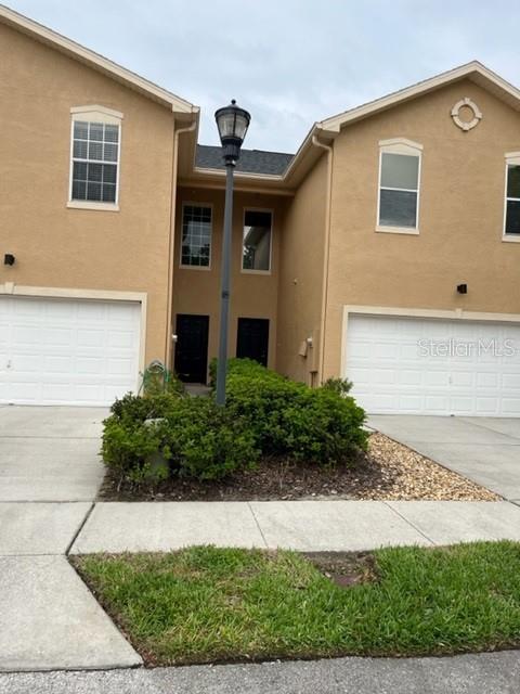 Tampa Palms 2 bedroom 2.5 bath 1 car garage townhouse offers over 1,526 sq ft of living space. This home is located in the gated community of Emerald Pointe Townhomes at Tampa Palms. Entering into the townhome you will find soaring ceilings, newer vinyl floors throughout the entire downstairs with newer carpet on the stairs. A large living room, dining room, kitchen and a half bathroom are on the main floor. Access to the garage off the kitchen area offers washer and dryer. There is a sliding glass door that leads out to the back porch area. Moving upstairs you will find vinyl flooring throughout entire second floor. There is also a full bathroom located on the 2nd floor. This community offers a pool and rent includes landscaping. Sorry no pets!