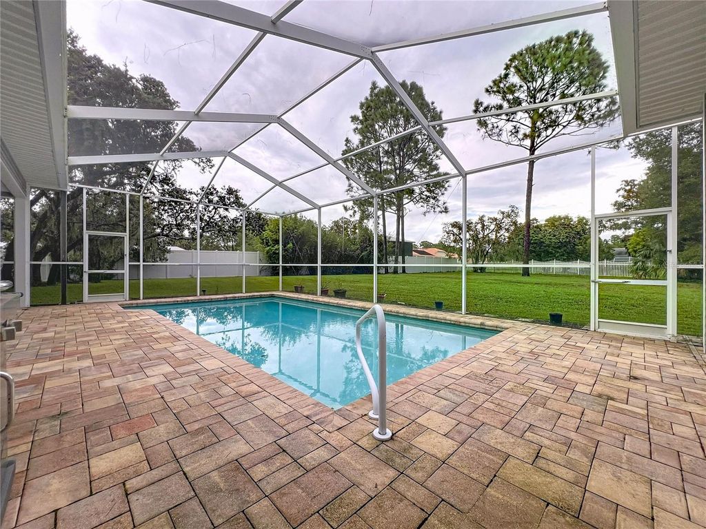 Photo of 13383 Cooper Road, Spring Hill, FL 34609 (MLS # W7878460)