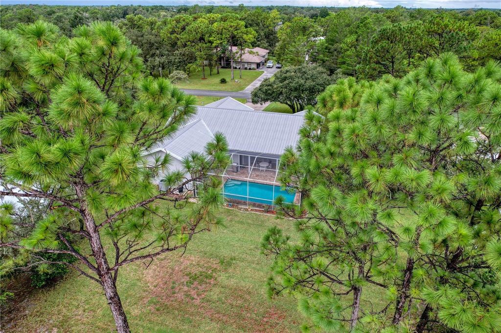 Photo of 13383 Cooper Road, Spring Hill, FL 34609 (MLS # W7878460)