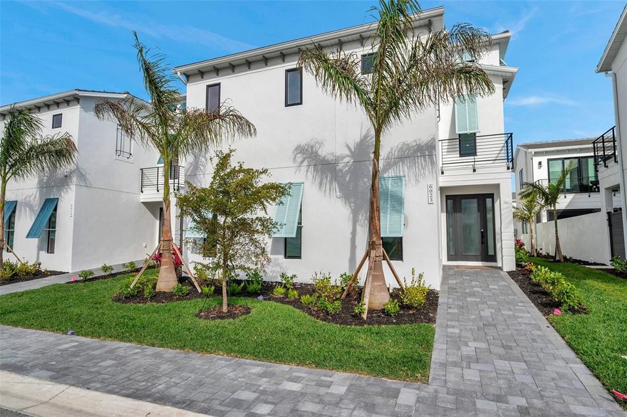 Brand New 2025-Built Salt Meadow Two-Story Residence on a Premium Lot, Steps Away from Aqua’s 4-Acre Blue Lagoon. This exquisite Salt Meadow two-story residence offers exclusive access to Aqua’s 4-acre translucent blue lagoon and tropical beach, featuring world-class amenities. The sparkling lagoon and soft sandy shore provide an idyllic setting for swimming or relaxing with family and friends while enjoying the bay breeze and Florida sun. Boasting over 4,000 square feet of meticulously designed living space, this home comprises four spacious bedrooms and four luxurious bathrooms. Notable Features Include: Expansive open floor plan enhanced by abundant natural light;  Gourmet kitchen with custom Serenity Kraft Maid cabinetry, quartz countertops, a large island, and a premium LG Signature Range featuring gas, induction, and sous vide capabilities; Private courtyard oasis with heated pool, waterfall feature, and lanai prepared for an outdoor kitchen; Elegant primary suite with walk-in closet, private balcony, and spa-inspired bathroom featuring soaking tub and frameless rain shower; Walk-in closets in all bedrooms with en-suite or adjacent bathrooms; Convenient second-floor laundry room and two-car garage; Elevator prep. ready; Located in one of Florida’s most sought-after non-flood zones, Aqua offers convenient access to IMG Academy, world-class golf courses, the beaches of Bradenton and Anna Maria Island, Sarasota Bay, SRQ Airport, and the University Town Center Mall.
