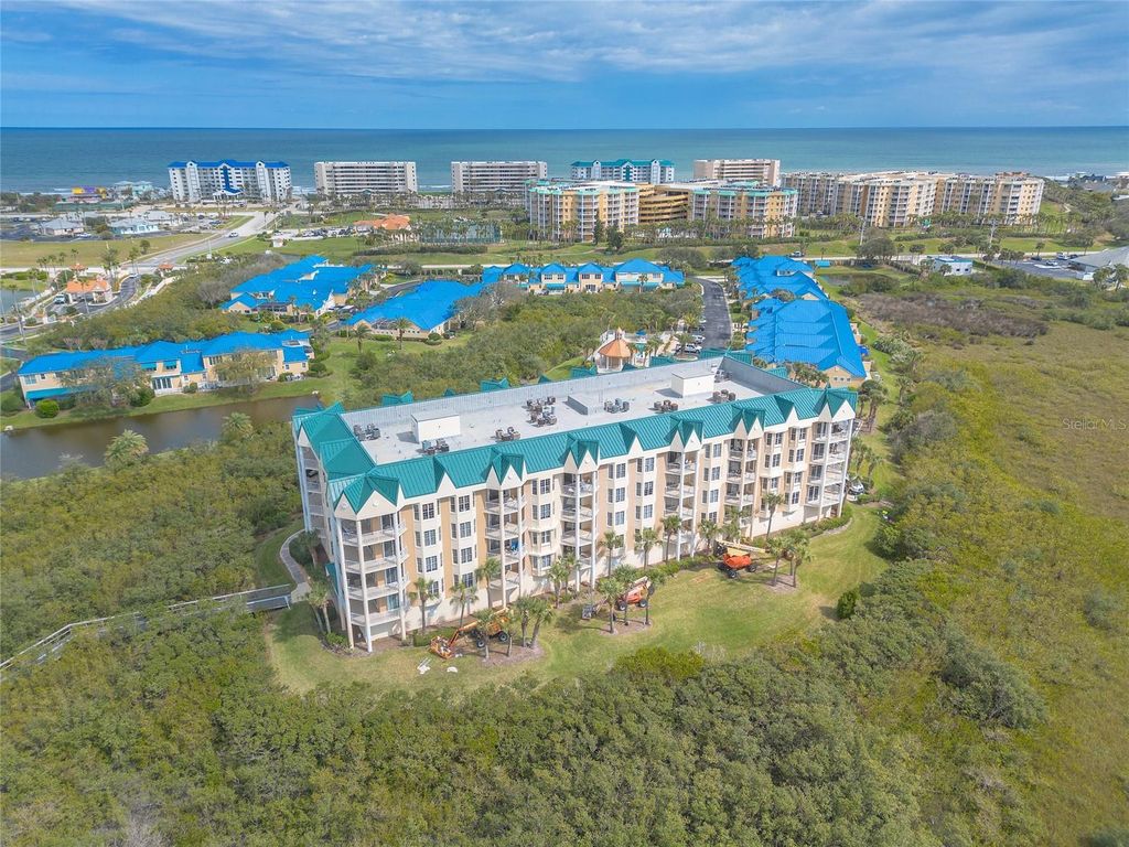 Photo of 4672 Riverwalk Village Court #8402, Ponce Inlet, FL 32127 (MLS # NS1086132)