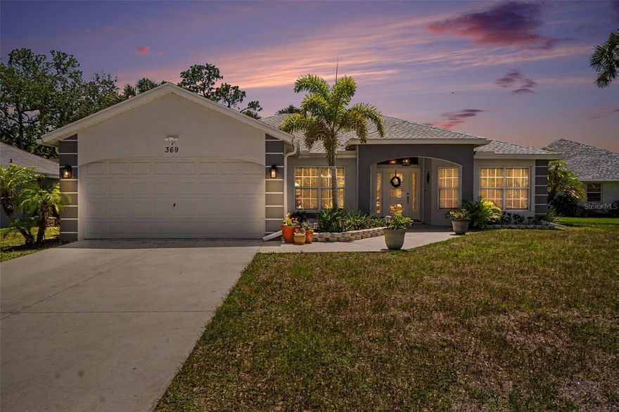 From the new impact-rated double front door to the stainless-steel smart appliances, this beautifully updated Deep Creek home blends modern upgrades with comfortable Florida living. Step inside to a bright interior featuring neutral colors, granite countertops, and stylish touches throughout. Major updates include a new roof (2022), A/C (2025), and water heater (2019) for added peace of mind. The split floor plan offers privacy, with the spacious primary suite located on the opposite side of the home. The primary bedroom includes a walk-in closet and sliding doors leading to the enclosed lanai. Two guest bedrooms and a bath can be closed off with a custom barn door, creating a comfortable private guest wing. Enjoy Florida living outdoors with the enclosed lanai and a 14' x 18' screened patio (featuring Cooleroo blinds for shade and added privacy), perfect for relaxing or entertaining. The backyard offers a peaceful, park-like setting with plenty of room to add a pool. Situated on an oversized .25-acre corner lot, the home also includes a convenient generator-ready exterior outlet. Deep Creek is conveniently located near shopping, restaurants, and golf. Be sure to click on the virtual tour link!