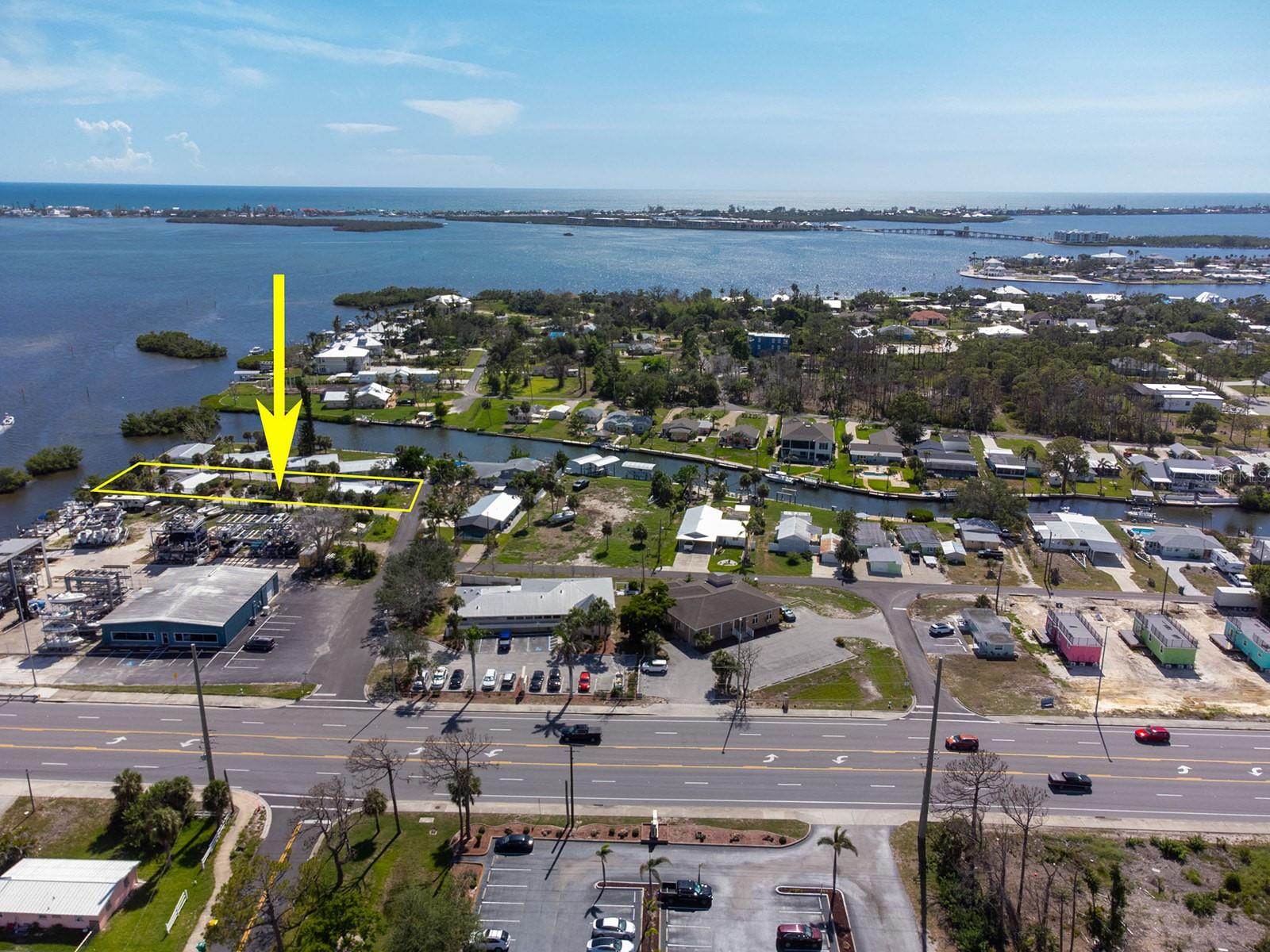 A truly rare find, this waterfront property, though impacted by recent Florida hurricanes, offers unparalleled potential for a discerning buyer. Imagine crafting your ultimate coastal retreat on this prime lot, boasting 70 feet of direct water frontage complete with a seawall and dock. Enjoy the coveted convenience of no bridges to the Intracoastal Waterway, granting seamless and direct access to both the Intracoastal and the Gulf for all your boating adventures or those of future renters.
Currently, the property features a small 2/1 single family home with a pool, along with a separate duplex, providing excellent flexibility for additional income or comfortable accommodations for extended family and guests. Zoned RMF-10 (Residential Multi-Family, 10 units per acre), this property holds immense redevelopment opportunities in flood zone AE. A new metal roof, installed in 2023, provides a solid foundation for your vision. Waterfront properties with such direct access and extensive frontage are increasingly scarce, making this an exceptional chance to secure your piece of paradise and rebuild to your exact specifications.