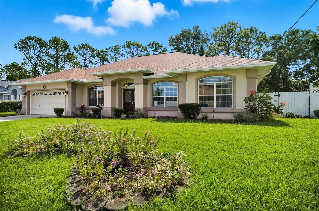 Photo of 7 Woodfalon Place, Palm Coast, FL 32164 (MLS # FC310703)