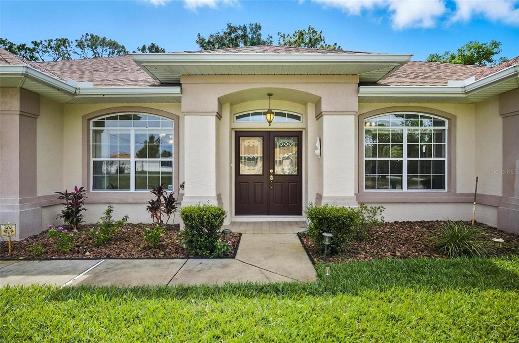 Photo of 7 Woodfalon Place, Palm Coast, FL 32164 (MLS # FC310703)